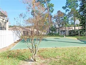 157 Springwood Circle, Unit C Longwood, FL 32750 - Photo 25 of 26 a view of a park with large trees