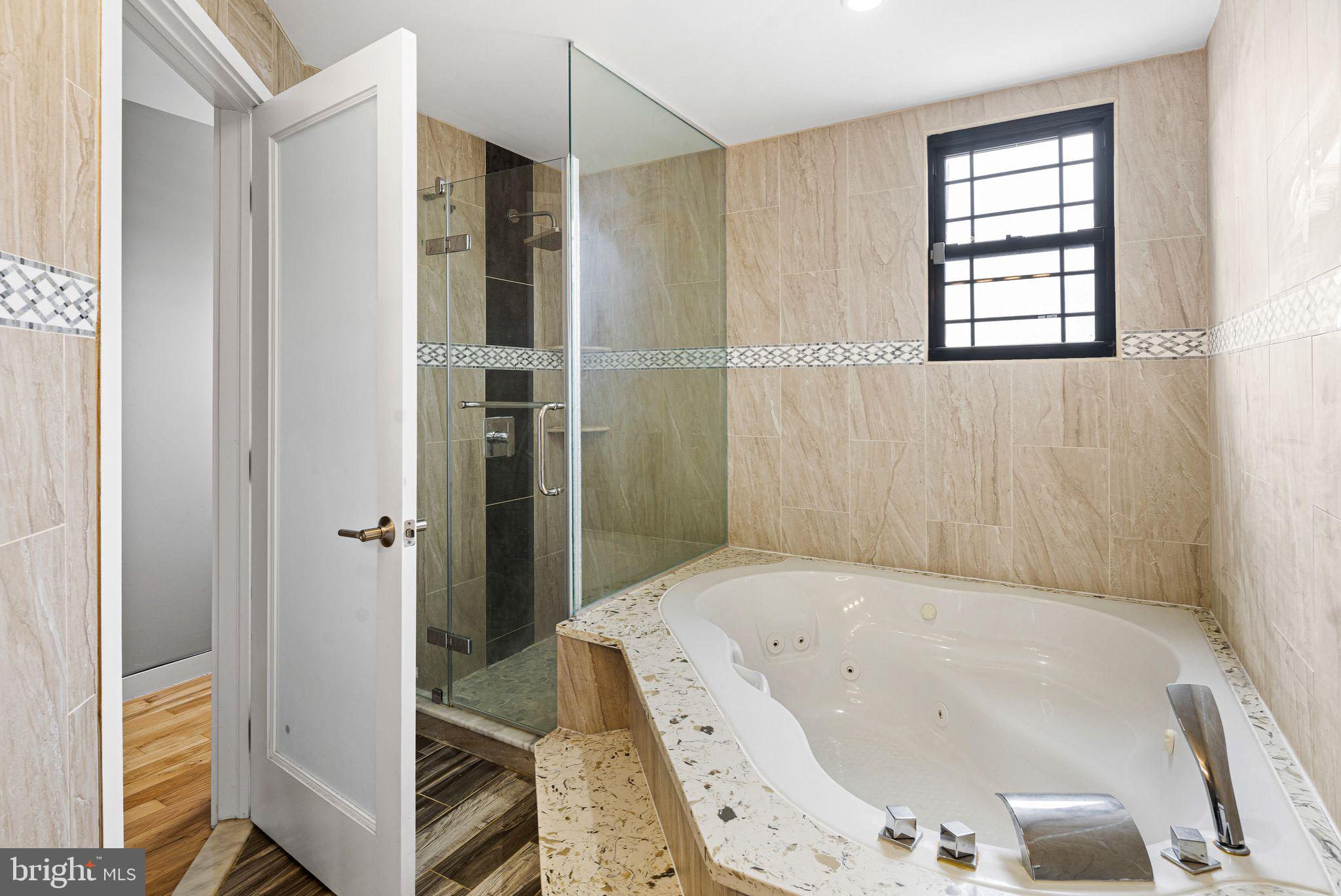 126 Tasker Street Philadelphia, PA 19148 - Photo 27 of 30 primary bath with soaking tub