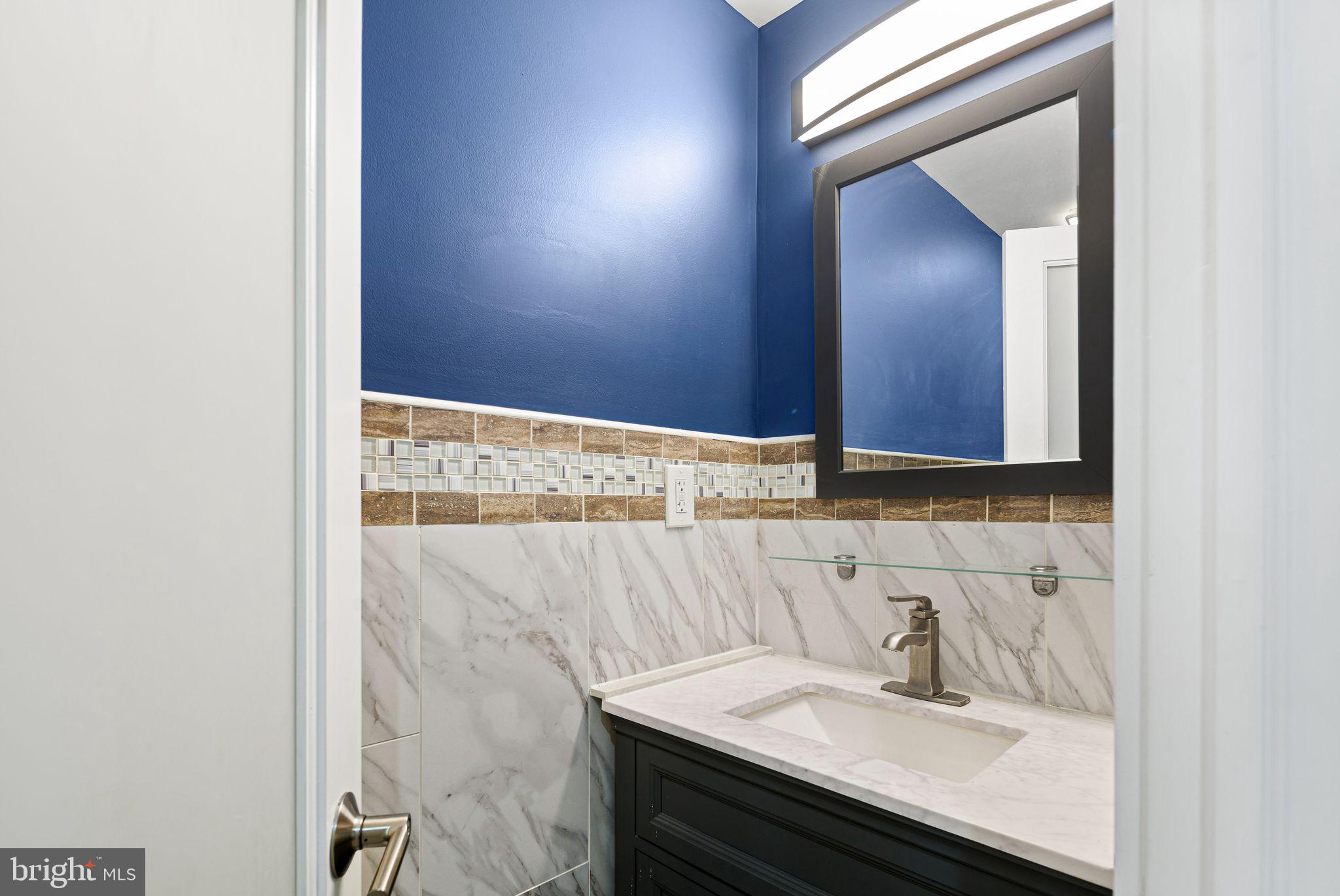 126 Tasker Street Philadelphia, PA 19148 - Photo 4 of 30 main level half bath