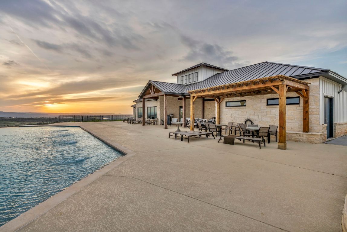 Lot 34 High Range Drive Kingsland, TX 78639 - Photo 11 of 15 a view of a house with dining area and roof