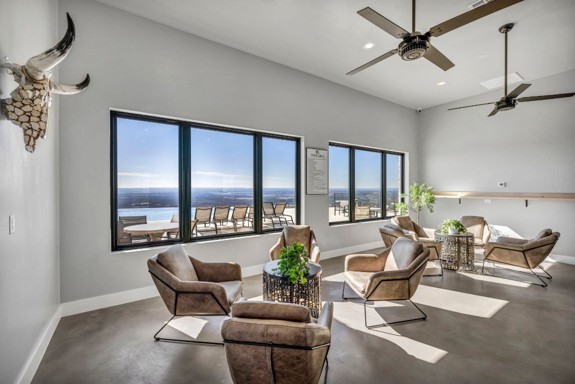 Lot 34 High Range Drive Kingsland, TX 78639 - Photo 7 of 15 a living room with furniture and floor to ceiling windows