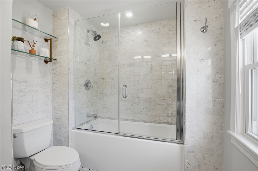 1390 Brainard Road Lyndhurst, OH 44124 - Photo 24 of 33 Full bathroom with combined bath / shower with glass door and plenty of natural light