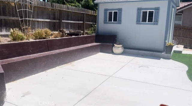 a view of a porch with furniture