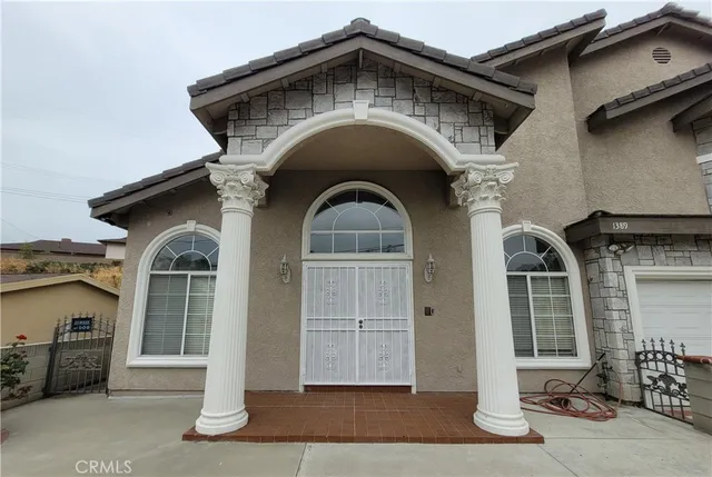 a front view of a house with balcony