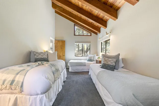 a bathroom with a double vanity sink mirror and double