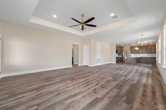 a view of a livingroom with a hardwood floor