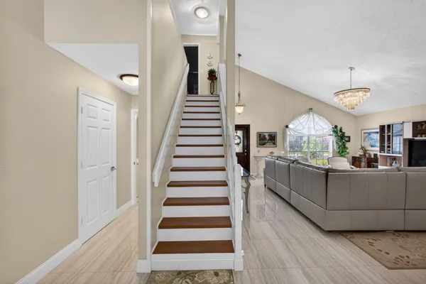 a view of a chairs and table in a patio