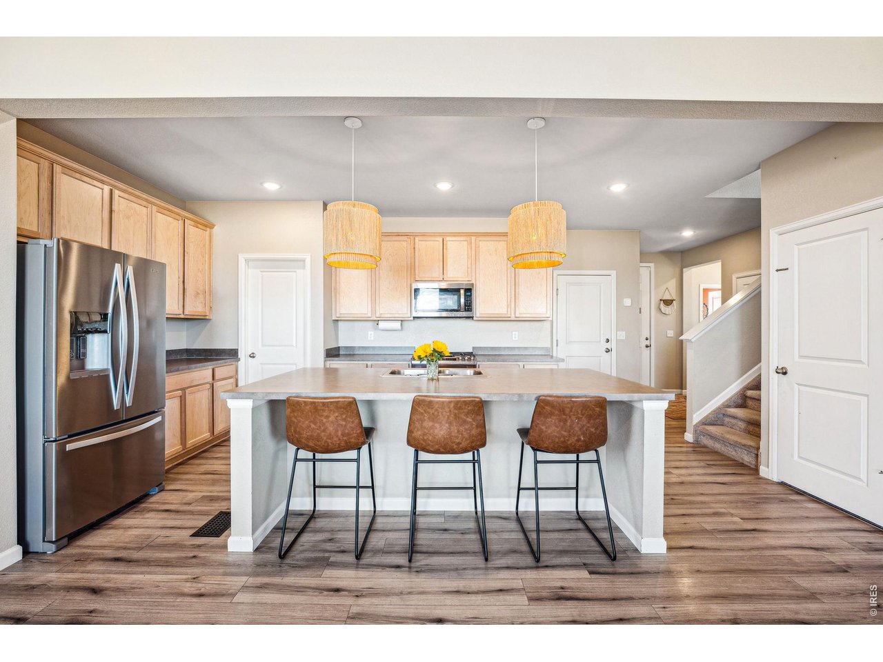 376 Country Road Berthoud, CO 80513 - Photo 7 of 33 Breakfast bar makes for great entertainment space
