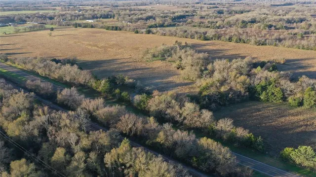 a view of a lake with lots of residential buildings