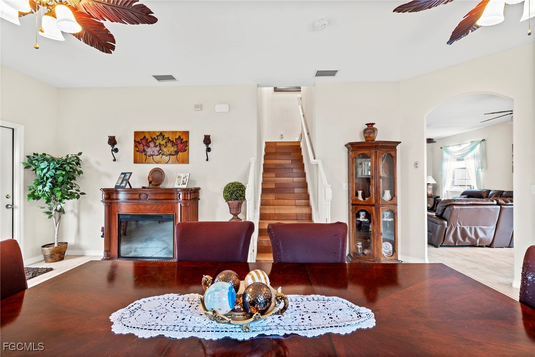 8657 Sumner Avenue Fort Myers, FL 33908 - Photo 4 of 29 a living room with furniture and a fireplace