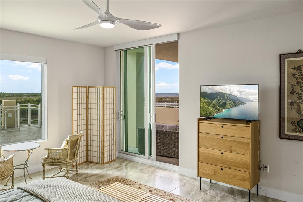 795 Collany Road, Unit 205 St. Petersburg, FL 33715 - Photo 39 of 67 a view of a livingroom with furniture and windows