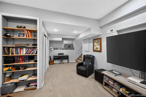 a livingroom with window and workspace