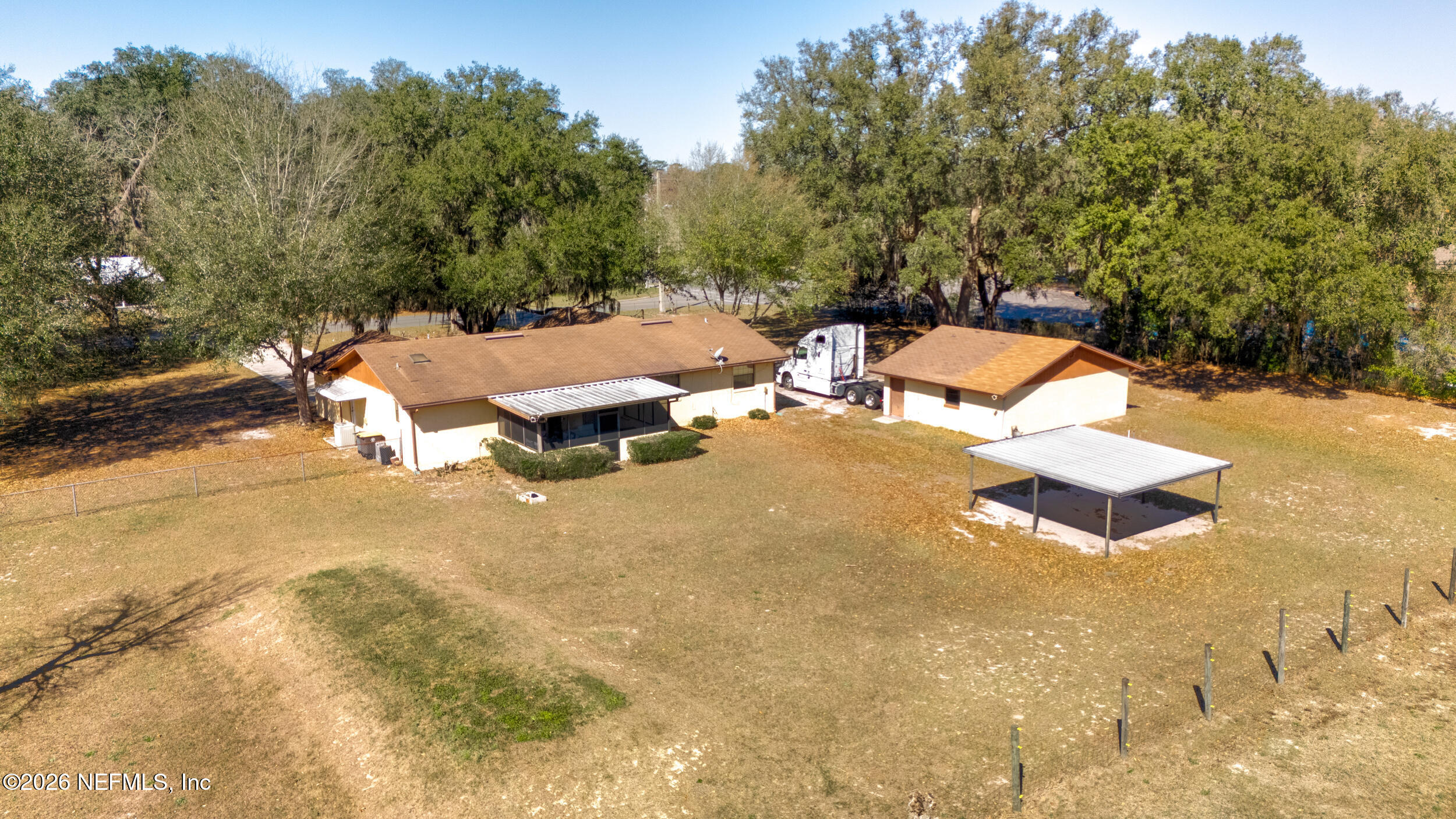 4065 Magill Road Jacksonville, FL 32220 - Photo 18 of 42 a view of a patio with swimming pool