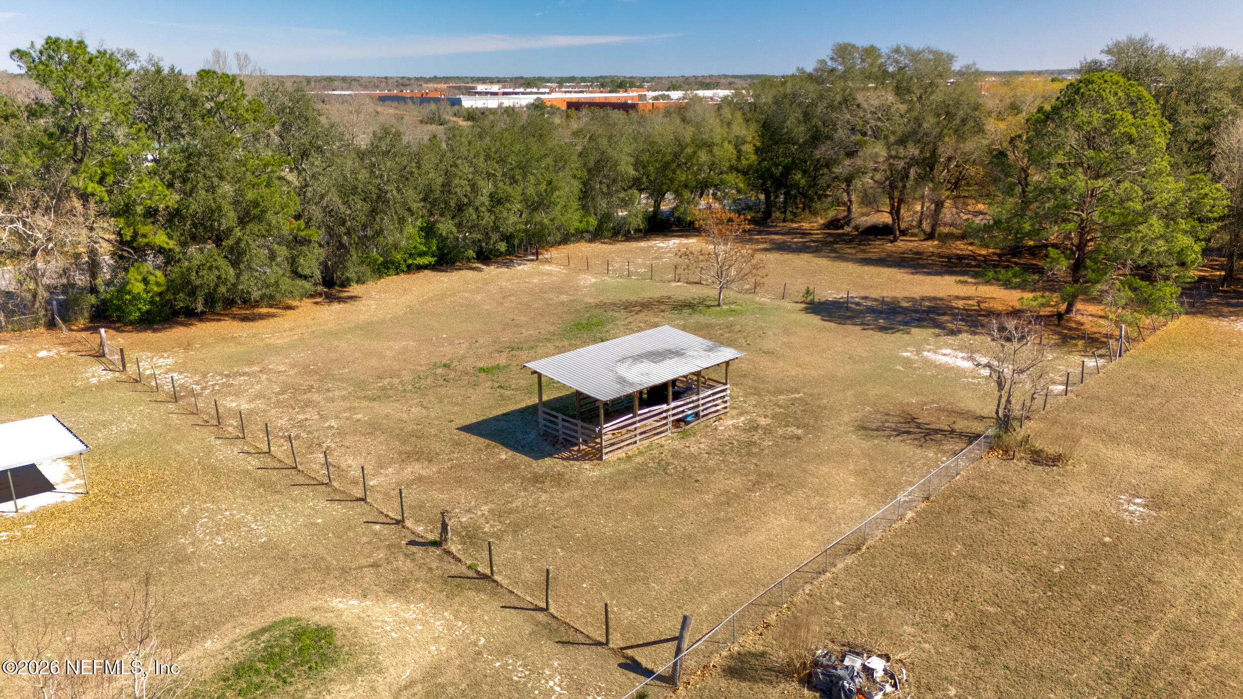 4065 Magill Road Jacksonville, FL 32220 - Photo 19 of 42 a view of a backyard of a house