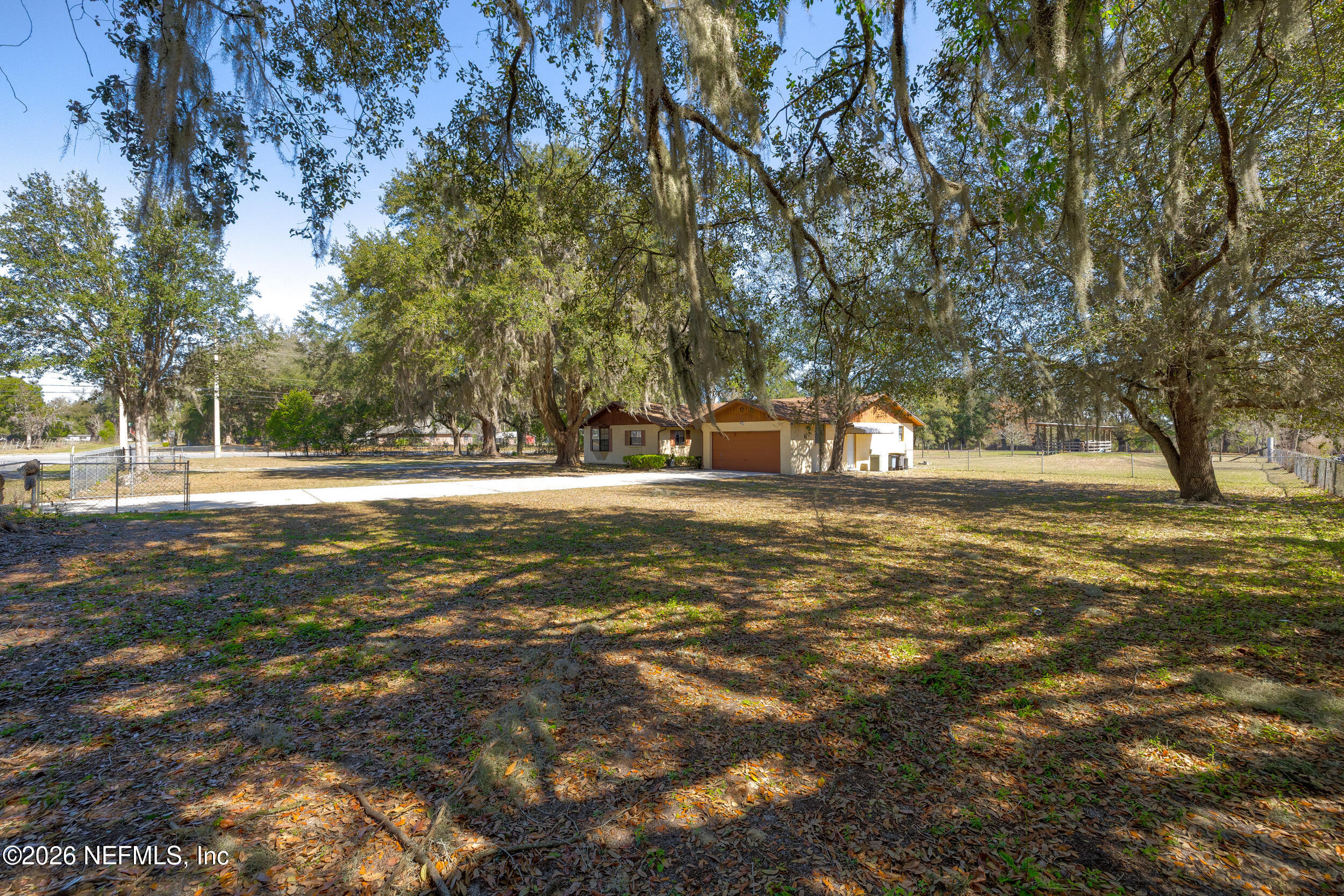 4065 Magill Road Jacksonville, FL 32220 - Photo 24 of 42 a view of outdoor space with trees