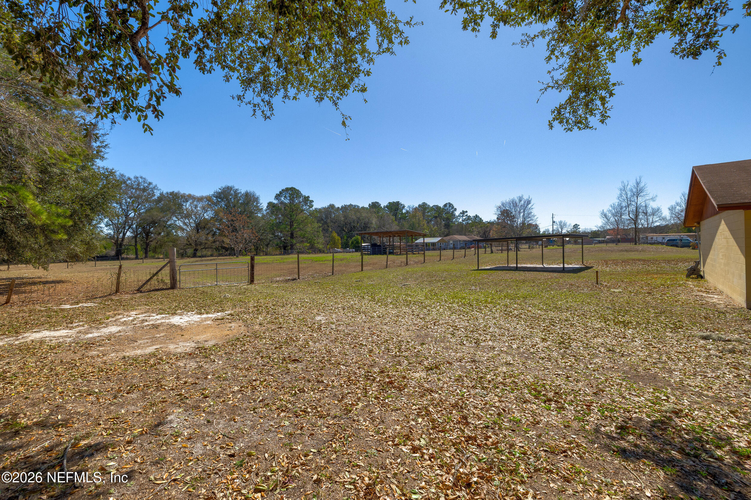4065 Magill Road Jacksonville, FL 32220 - Photo 29 of 42 a view of a lake with houses in the back