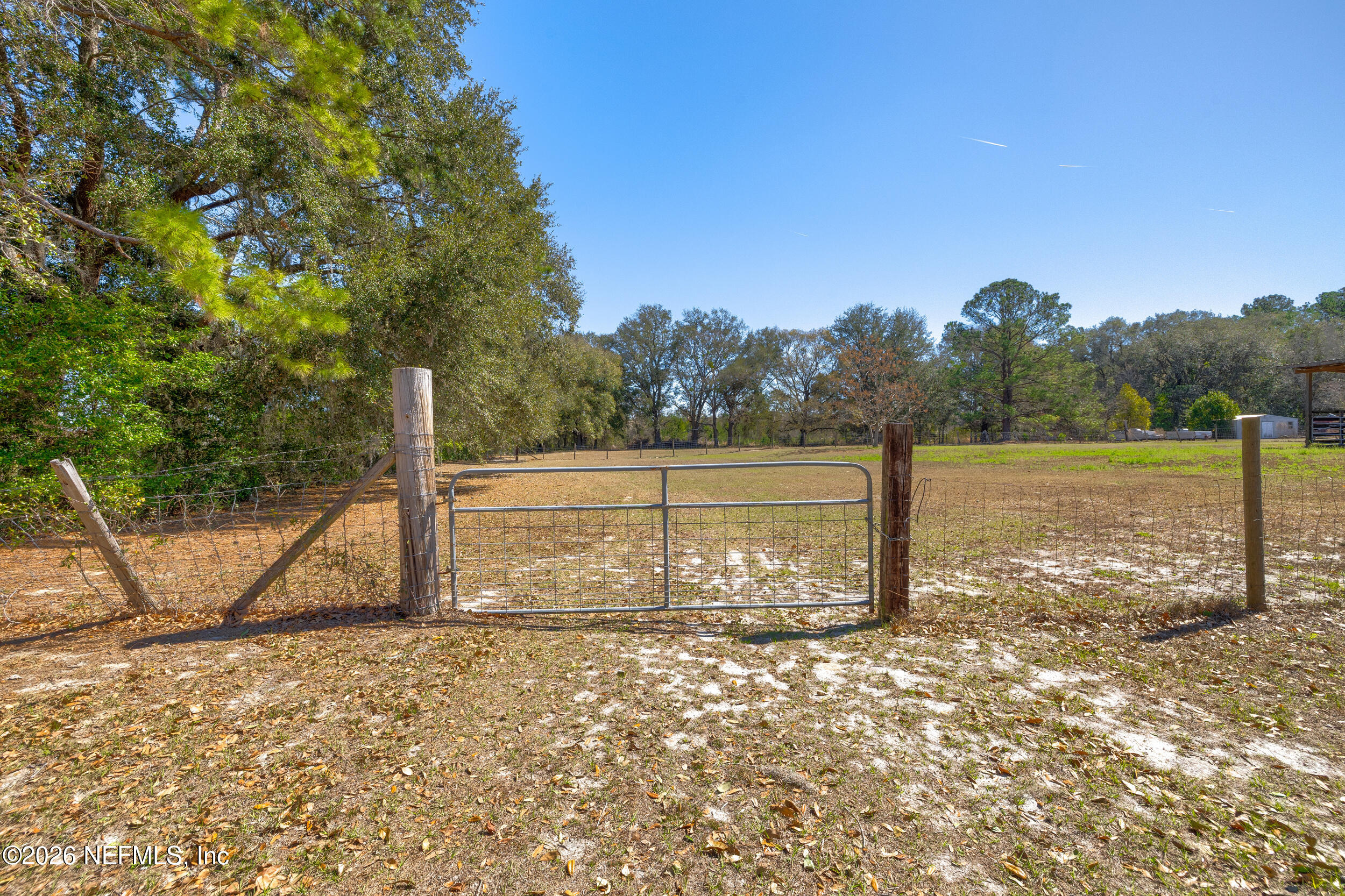 4065 Magill Road Jacksonville, FL 32220 - Photo 32 of 42 a view of a field with a slide