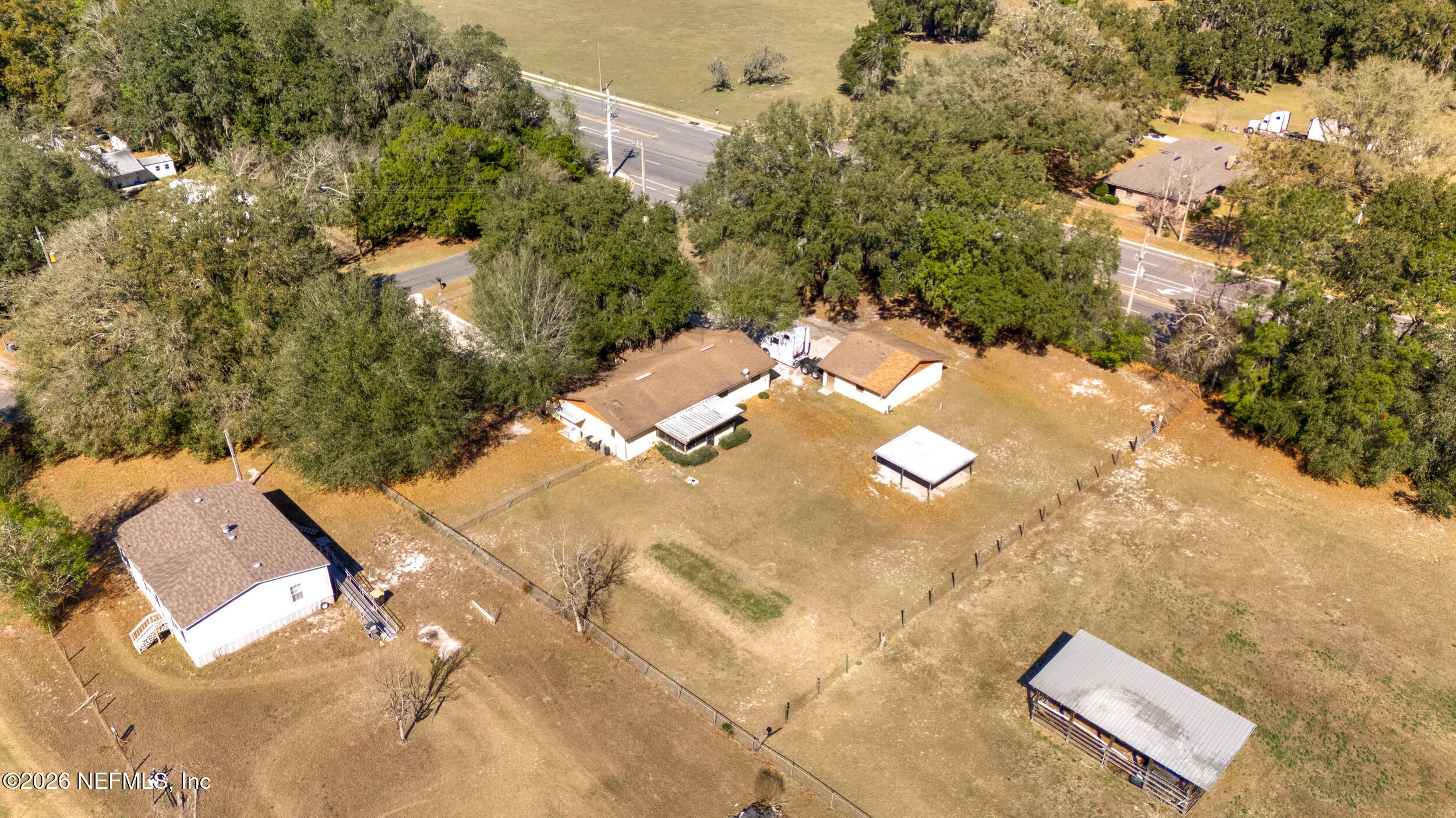 4065 Magill Road Jacksonville, FL 32220 - Photo 6 of 42 an aerial view of a house with yard
