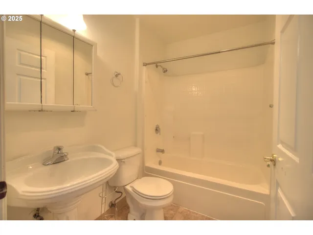 a view of a room with an empty space