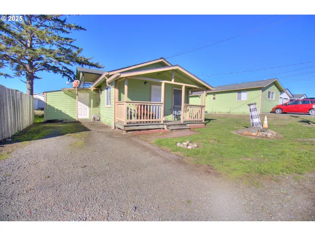 a view of a living room and a wooden floor