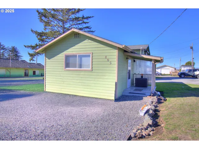 a view of a backyard with a chair
