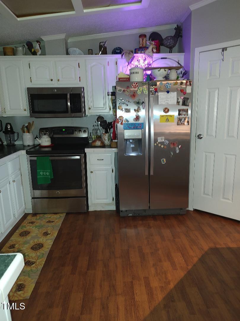 2960 Federal Road Benson, NC 27504 - Photo 27 of 45 Kitchen is so quaint, but has plenty of counter top space and tons of cabinets nice sized pantry as well