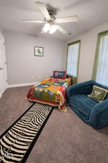 705 Crystal Spring Drive Sanford, NC 27332 - Photo 11 of 21 a bedroom with a bed and window