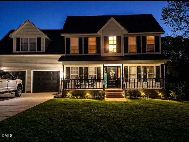 705 Crystal Spring Drive Sanford, NC 27332 - Photo 2 of 21 a front view of a house with a yard