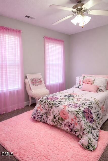 705 Crystal Spring Drive Sanford, NC 27332 - Photo 9 of 21 a bedroom with a bed and a window