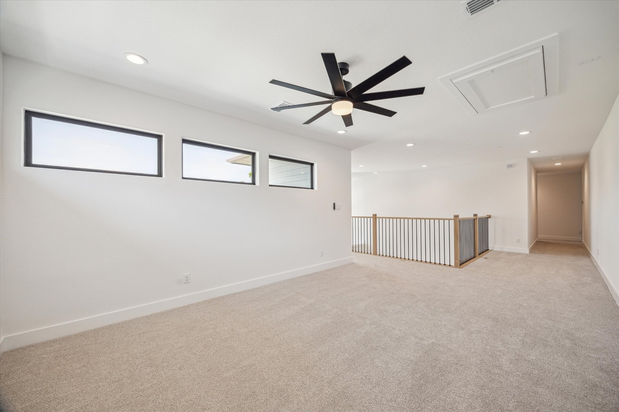 403 Venado View Court Conroe, TX 77304 - Photo 21 of 39 Another view of the upstairs loft space.