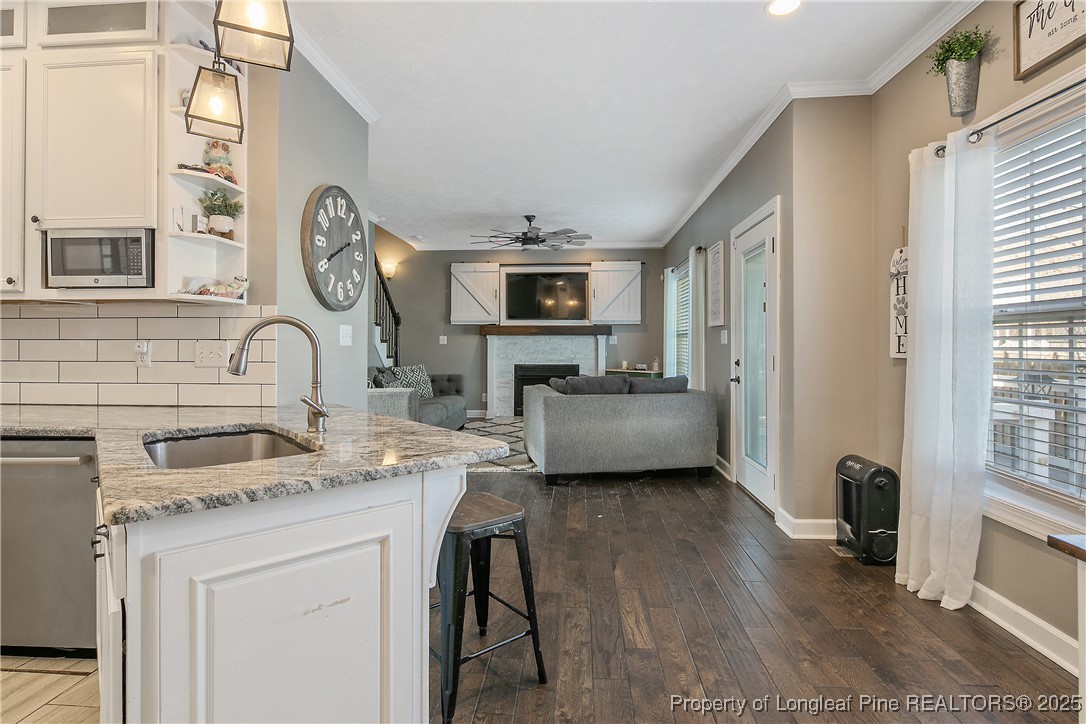 3524 Talus Road Fayetteville, NC 28306 - Photo 20 of 47 a kitchen with a sink cabinets and window