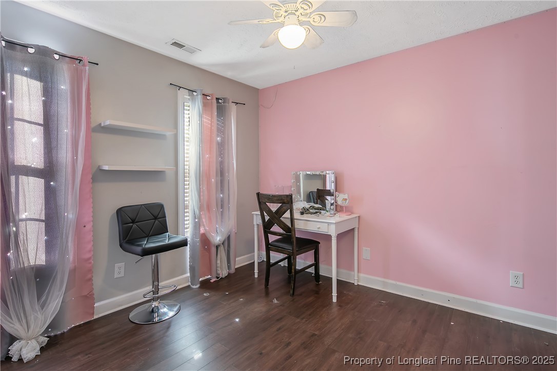 3524 Talus Road Fayetteville, NC 28306 - Photo 36 of 47 a view of a workspace with furniture and a window