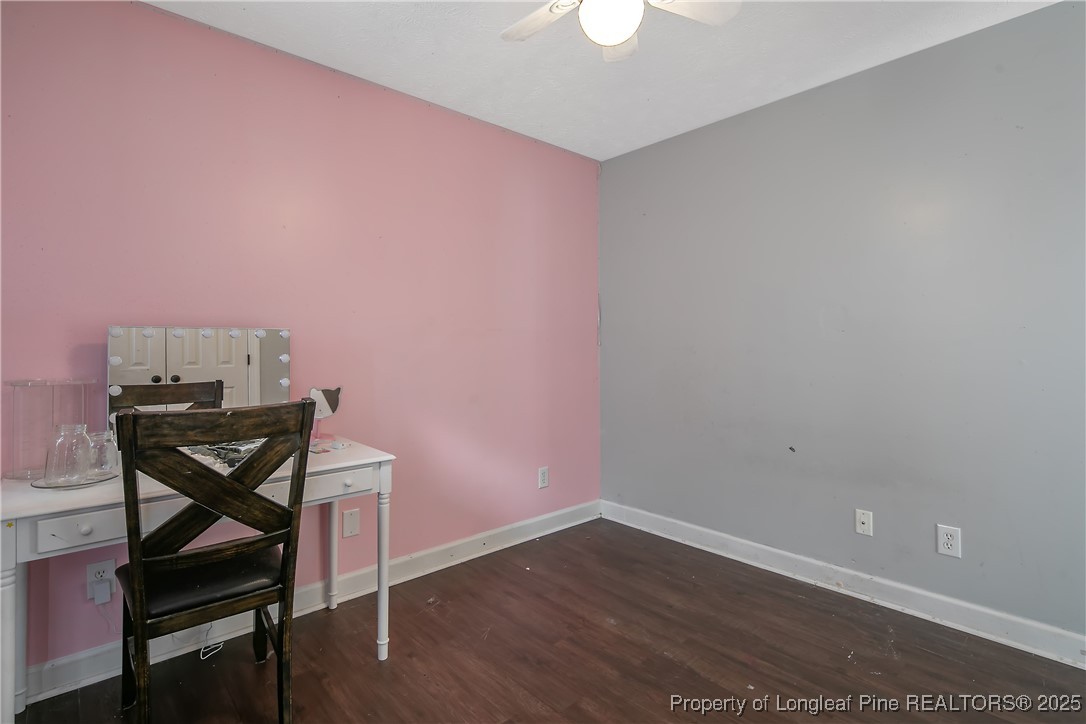 3524 Talus Road Fayetteville, NC 28306 - Photo 37 of 47 a view of a room with wooden floor and lounge chair
