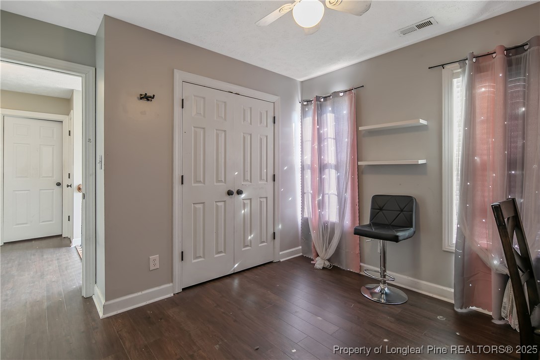 3524 Talus Road Fayetteville, NC 28306 - Photo 39 of 47 a view of a livingroom with entryway and wooden floor