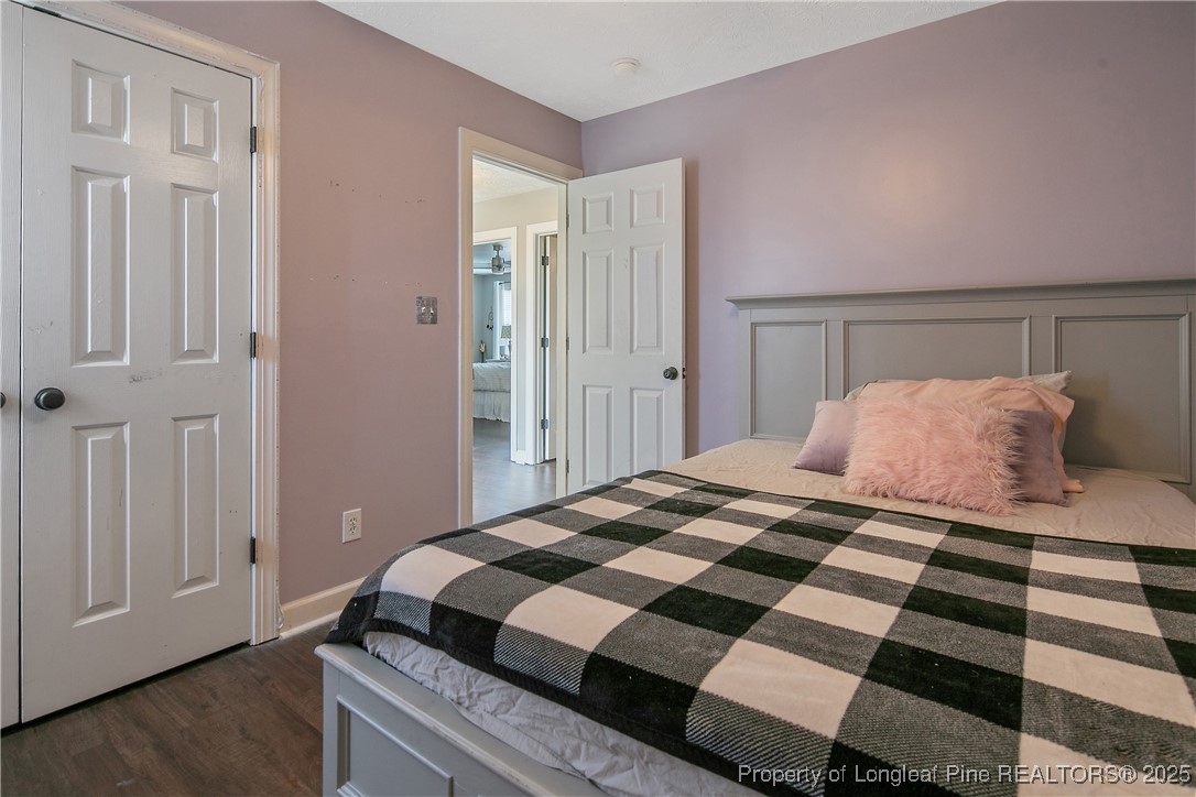 3524 Talus Road Fayetteville, NC 28306 - Photo 44 of 47 a bedroom with a bed and a dresser