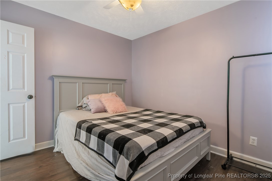 3524 Talus Road Fayetteville, NC 28306 - Photo 45 of 47 a bedroom with a bed and a window