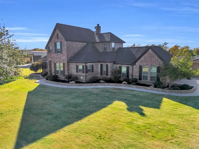 a view of a house with swimming pool