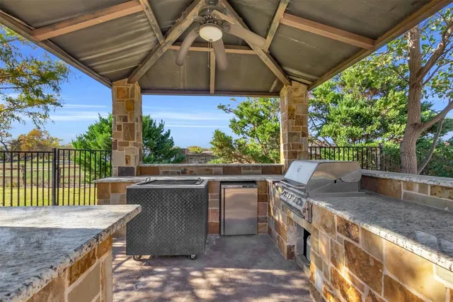 a view of a patio on the roof deck