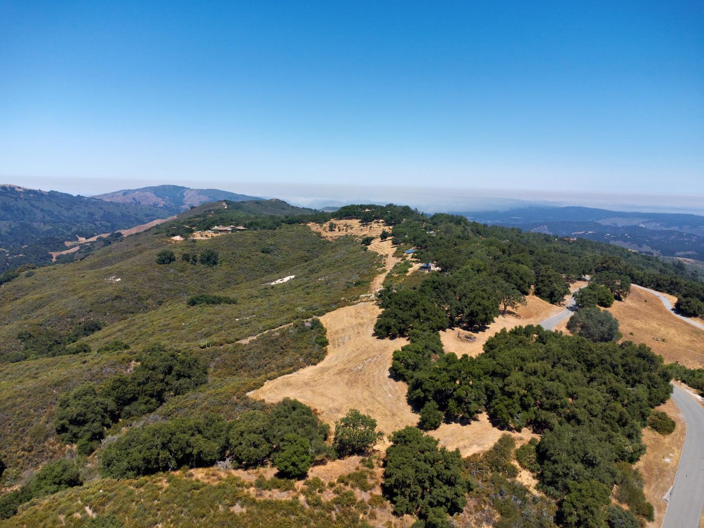 57 Chamisal Pass Carmel, CA 93923 - Photo 8 of 17 a view of a houses with a yard