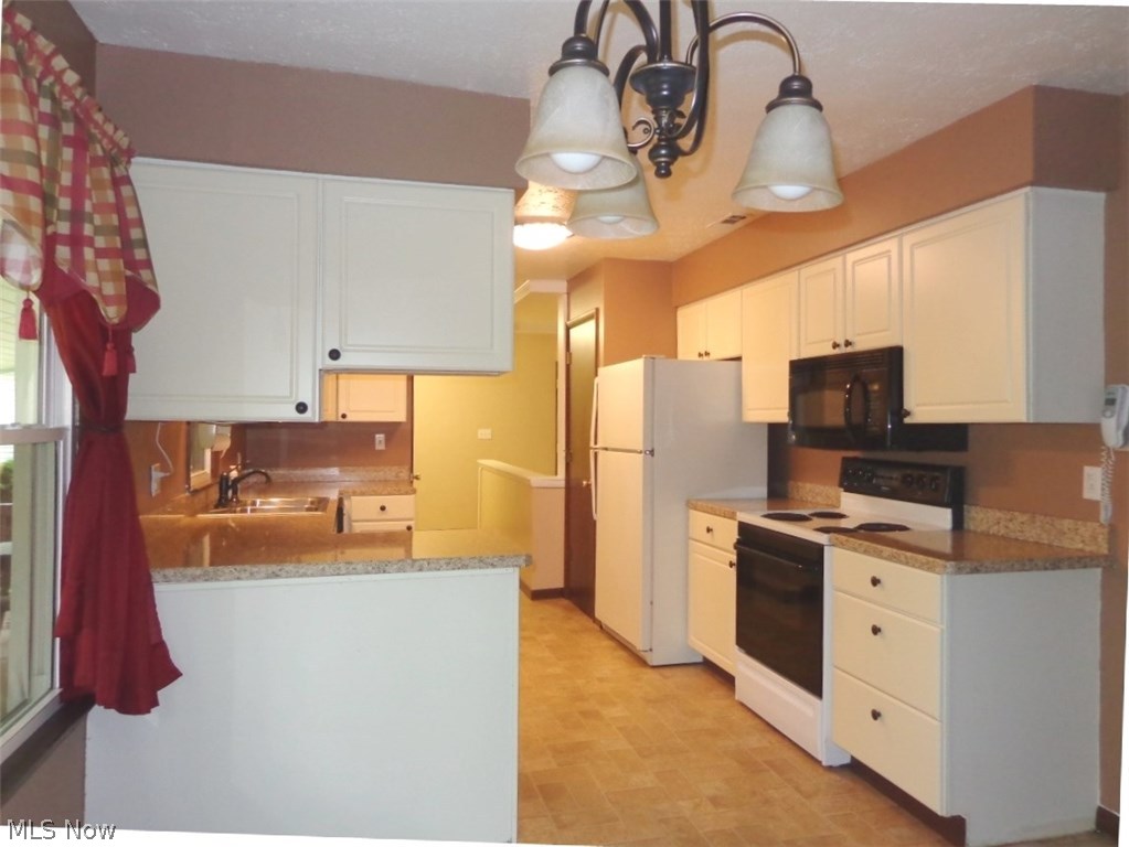 11167 Robson Road Grafton, OH 44044 - Photo 17 of 33 The Kitchen counter tops, sink & light fixtures were updated in 2014