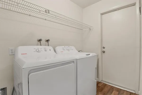 a utility room with dryer and washer