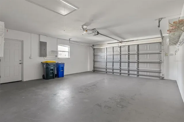 a view of a livingroom with furniture and staircase