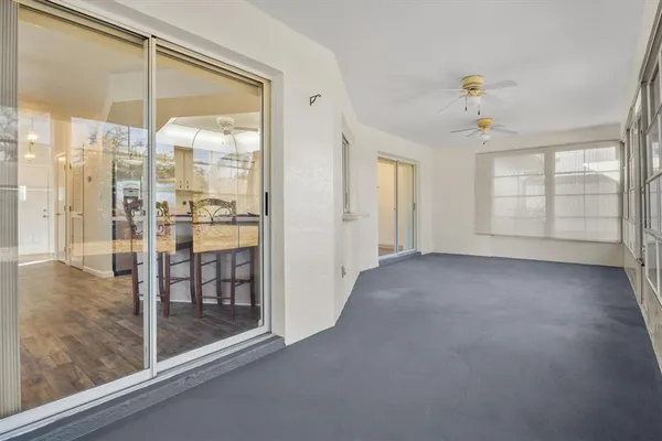 a view of an empty room and window