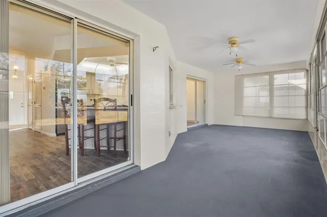 a view of an empty room and window