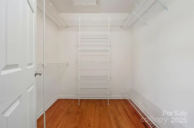 a view of a small space with racks on the wall