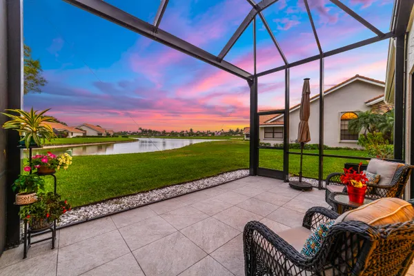 a view of a golf course with a house