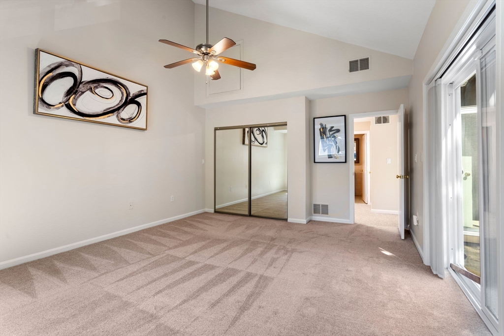 106 Captain Eames Circle, Unit 106 Ashland, MA 01721 - Photo 13 of 21 a view of a livingroom with a fan