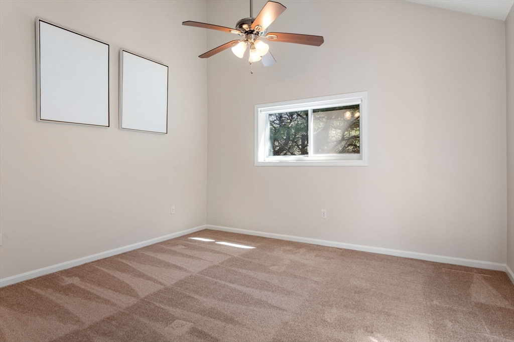 106 Captain Eames Circle, Unit 106 Ashland, MA 01721 - Photo 10 of 21 a view of an empty room