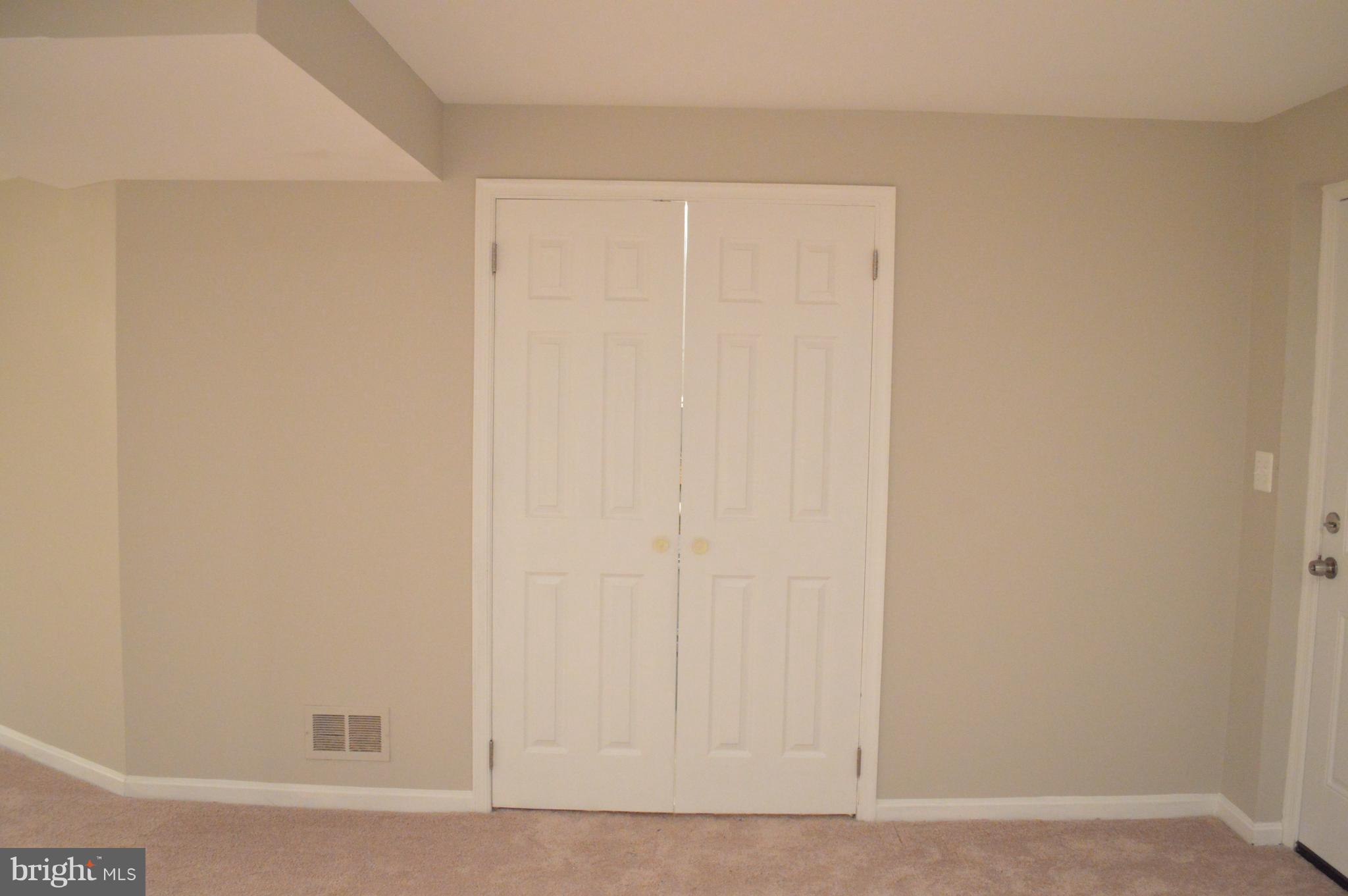 441 Broadwater Road Arnold, MD 21012 - Photo 24 of 30 Basement Utility Room Doors