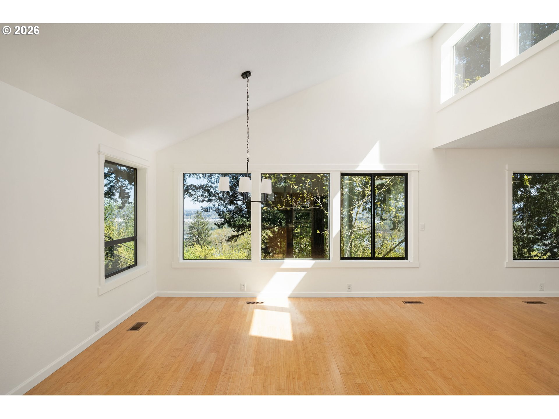 5844 Southwest Ralston Drive Portland, OR 97239 - Photo 12 of 43 a view of an empty room with window and cabinet